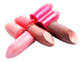 Several different lipsticks isolated on white