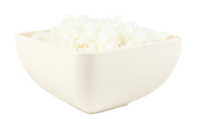 Cooked rice in bowl isolated on white