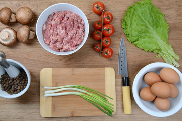 Different products on kitchen table close-up