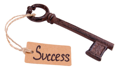 Key to success, Conceptual photo. Isolated on white
