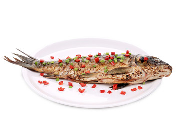 Fried fish on a white plate