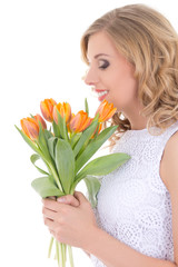 beautiful woman with bouquet of orange tulips isolated on white