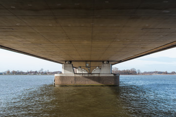 Underside of a long bridge in the Netherlands