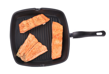 Salmon in pan.