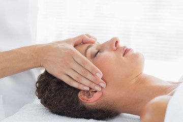 Fototapeta na wymiar Woman receiving head massage