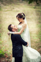 wedding. Bride and groom in the garden