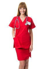 Pretty nurse in red .  working clothes