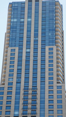 Glass and Stone Building with Balconies