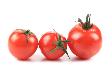 Three tomatoes in row.