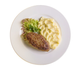 meat cutlet with mashed potatoes and greens
