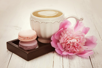 French macaroons and a cup of coffee