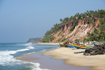 Tropical beach with fishing boats - obrazy, fototapety, plakaty