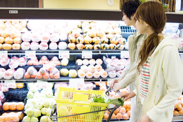 couple doing some shopping in supermarket