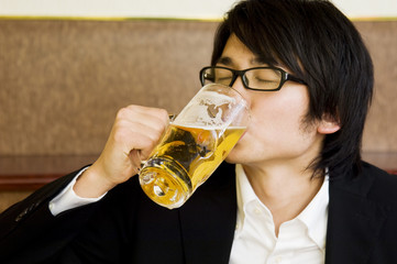 man drinking beer