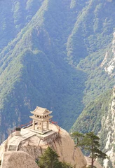 Deurstickers stone pagoda built on stone cliff at mountain huashan © lzf