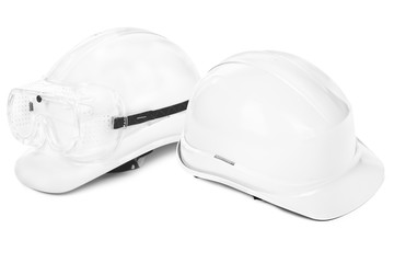 two white hard hats