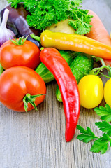 Vegetables with garlic on a board