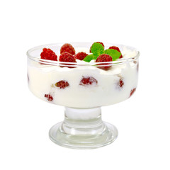 Yogurt thick with raspberries in glass bowl