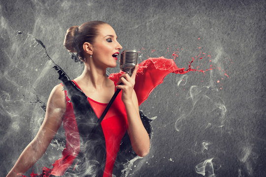 attractive female singer with microphone