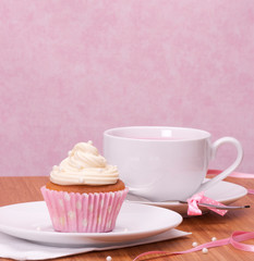Cupcake And Fruit Tea Cup On Wooden Background