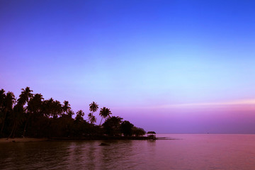 Fototapeta na wymiar Beautiful purple sunset on the beach, Koh Kood, Thailand