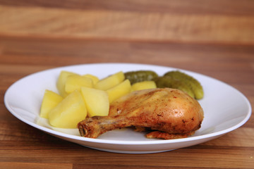 grilled chicken legs and potatoes