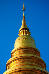Fototapeta premium Golden pagoda at Buddhist temple in Thailand.