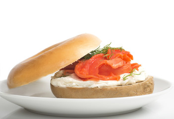 Plain bagel with cream cheese, salmon and dill