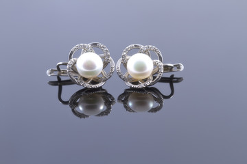 Set of silver earrings and a ring