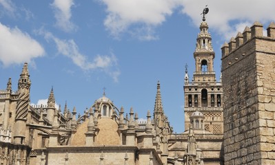 Fototapeta na wymiar Cathedral, Giralda and Alcazar wall.