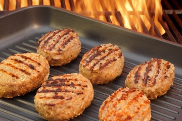 Burger put on the grill pan XXXL