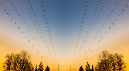 Electric power lines at sunset