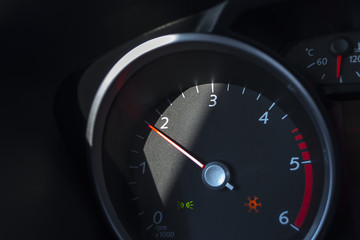 Car tachometer.