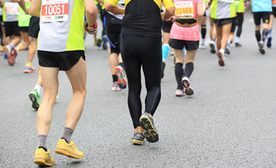 Fototapeta premium marathon athletes running on street 