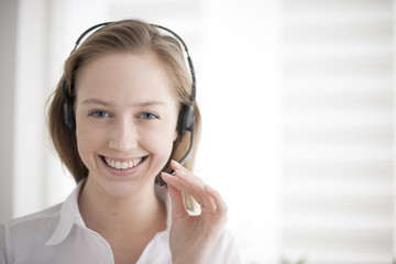 portrait of a beautiful young woman with headphones