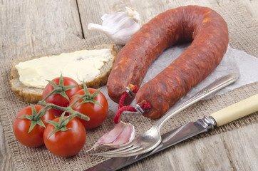 spanish chorizo on white paper