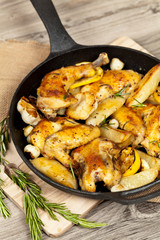 Garlic, Lemon and Rosemary Roasted Chicken on Frying Pan