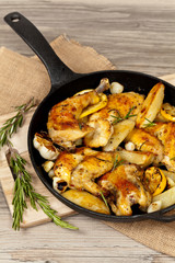 Garlic, Lemon and Rosemary Roasted Chicken on Frying Pan