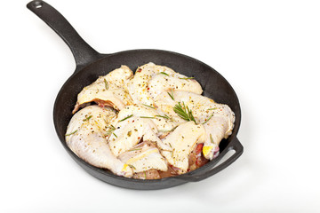 Raw chicken meat with rosemary and lemon ready to bake