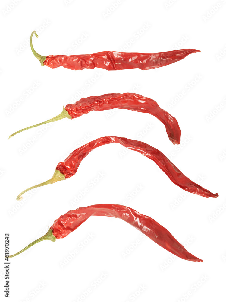 Wall mural set of withered red peppers. isolated on white. high definition