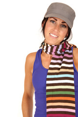 pretty female wearing hat and multi-colored striped scarf