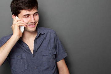 young man calling by phone