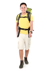 male hiker with backpack walking