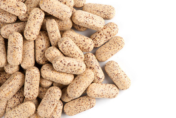 dietary supplement. multivitamin tablets on white