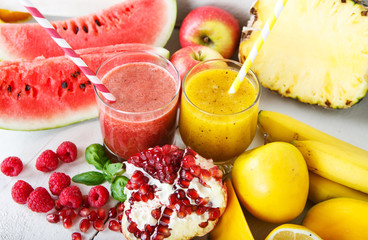 Fresh organic red and yellow smoothie with apple, watermelon, po