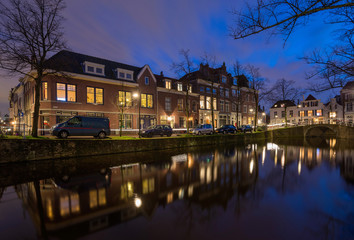 Fototapeta na wymiar Tranquil evening by the canal in the old city of Delft, The Neth