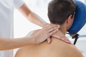 Fototapeta na wymiar Patient receiving shoulder massage