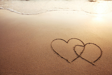 two hearts on the beach