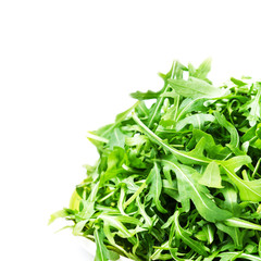 Arugula salad  isolated on white background close up. Heap of fr