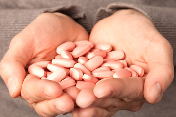 many pills in the hands